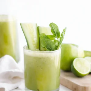 this image shows a glass full of cucumber mint juice