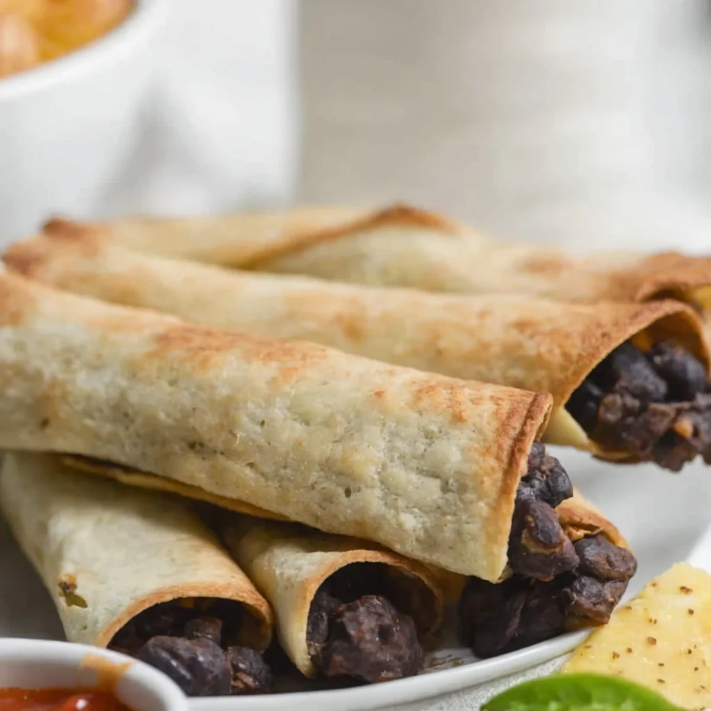 this-image-shows-the-Vegan-Black-Bean-Taquitos-Air-Fryer-on-a-plate