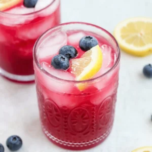 this image shows side of view of Lemon Blueberry Mocktail